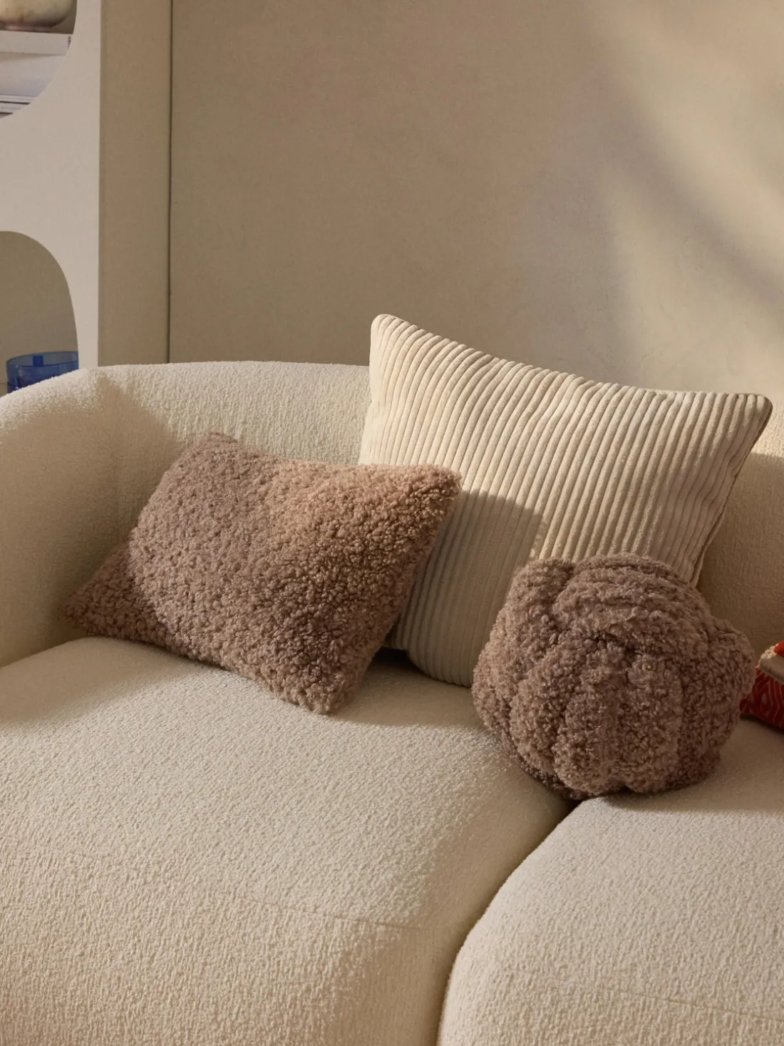 Cojín nudo de borreguillo Dotty