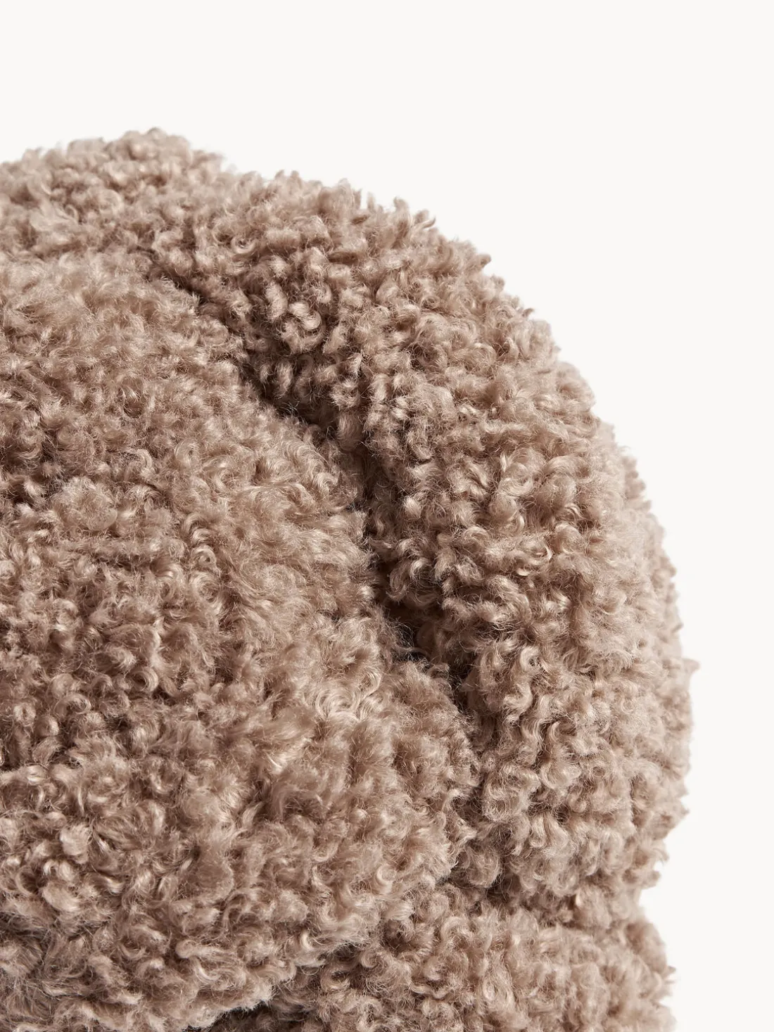 Cojín nudo de borreguillo Dotty