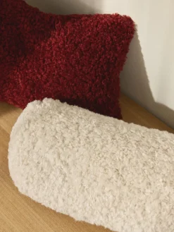 Cojín rulo de borreguillo Dotty