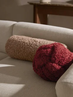 Cojín rulo de borreguillo Dotty