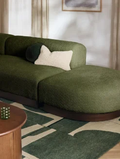 Diván modular de borreguillo bouclé con reposapiés Natalie