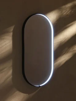 Espejo de pared ovalado con iluminación LED Avior