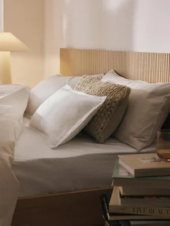 Funda de cojín artesanal de punto grueso Adyna