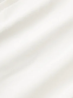 Funda de cojín de exterior con tejido estampado y flecos Suria