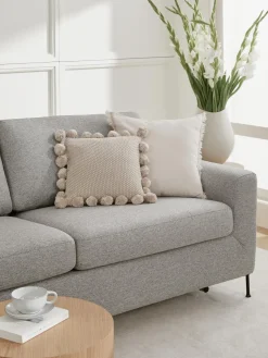 Funda de cojín de punto con pompones Molly