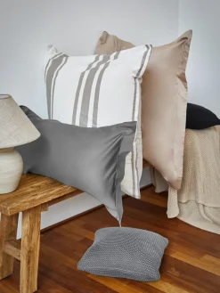 Funda de cojín de punto de algodón ecológico Adalyn