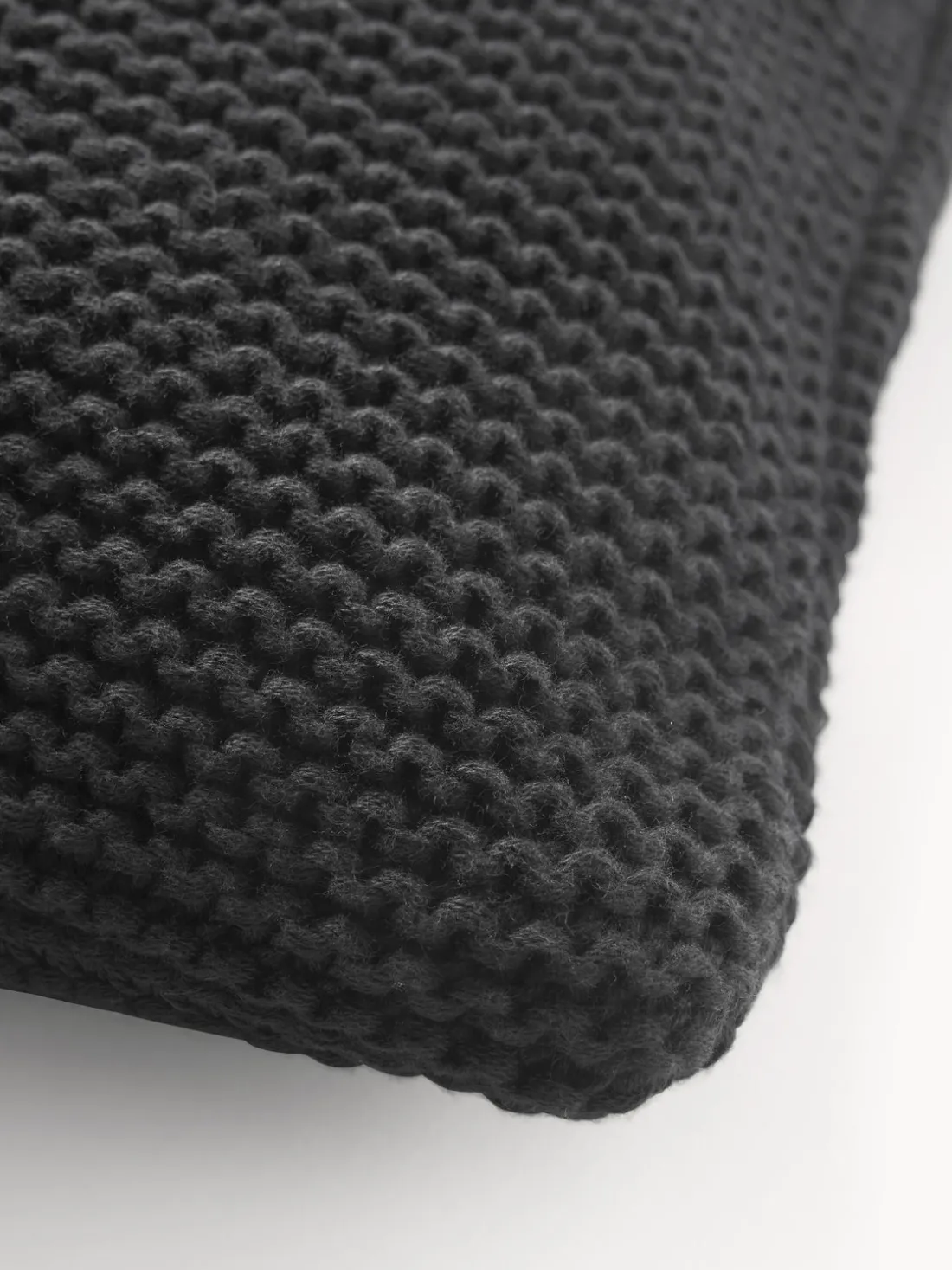 Funda de cojín de punto de algodón ecológico Adalyn