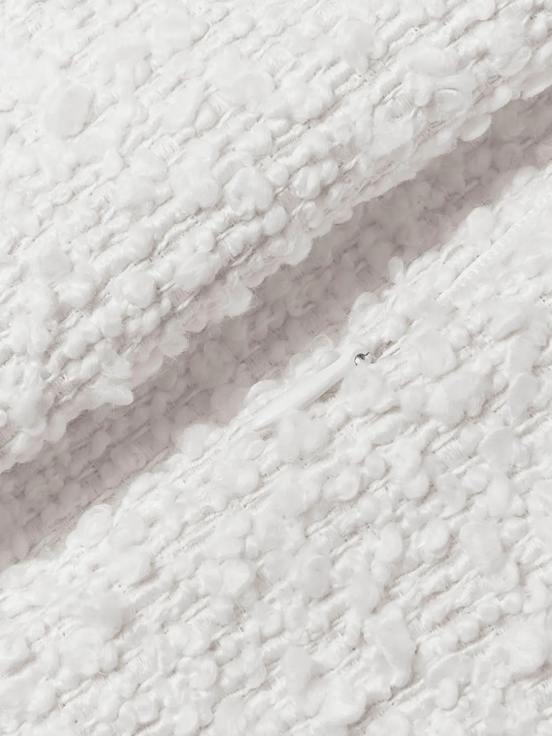 Funda de cojín en tejido bouclé Bellamie