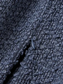 Funda de cojín en tejido bouclé Bellamie