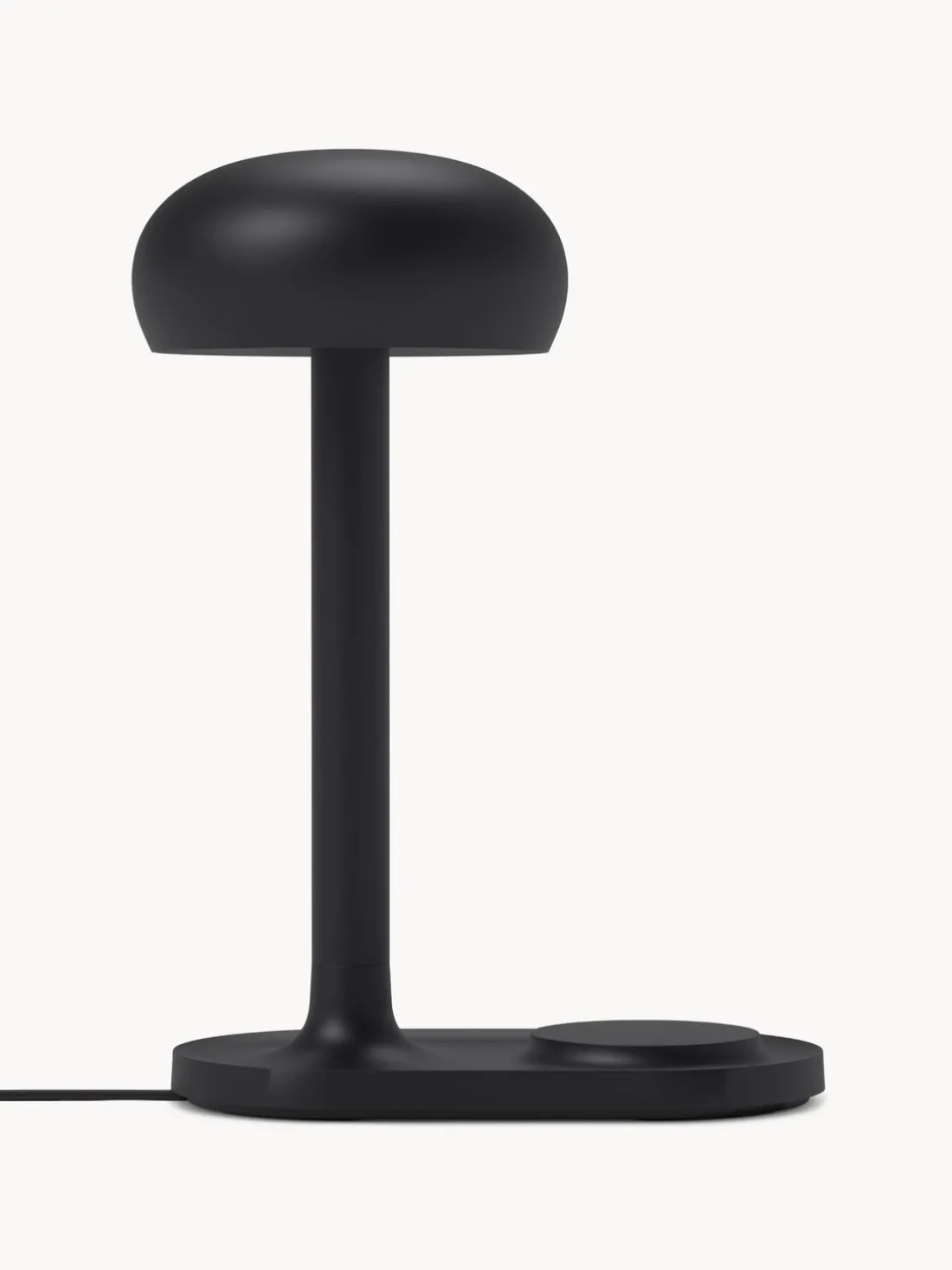 Lámpara de mesa pequeña regulable LED Emendo, con estación de carga