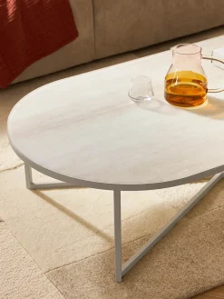 Mesa de centro ovalada con tablero de vidrio en look mármol Antigua