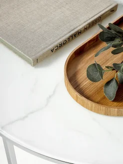 Mesa de centro redonda con tablero de vidrio en look mármol Antigua