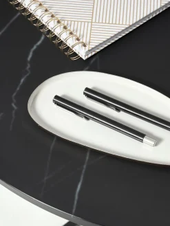 Mesa de centro redonda con tablero de vidrio en look mármol Antigua