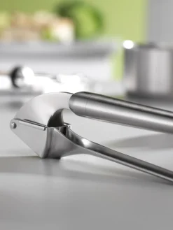 Prensa de ajo de acero inoxidable Pro