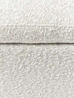 Puf en tejido bouclé con espacio de almacenamiento Winou