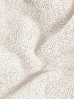 Puf en tejido bouclé Woolly