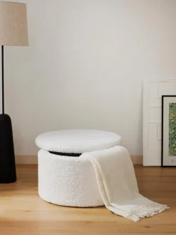 Puf grande de borreguillo con espacio de almacenamiento Alida