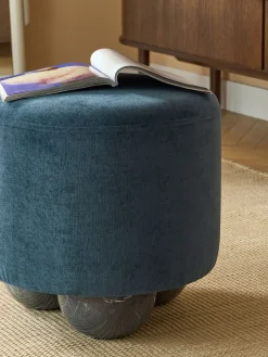 Puf reposapiés tapizado con patas de bola de mármol Lino