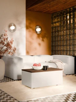 Reposapiés puf con espacio de almacenamiento Lennon