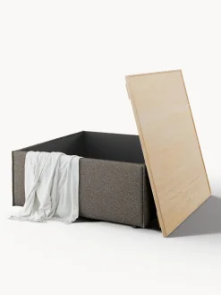 Reposapiés puf en tejido bouclé con espacio de almacenamiento Lennon