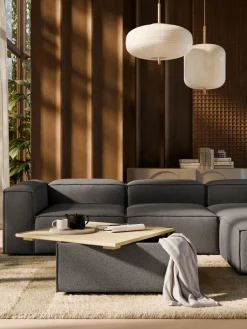 Reposapiés puf en tejido bouclé con espacio de almacenamiento Lennon