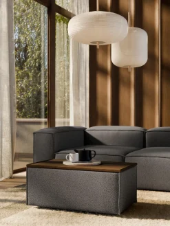 Reposapiés puf en tejido bouclé con espacio de almacenamiento Lennon