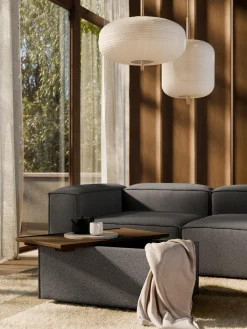 Reposapiés puf en tejido bouclé con espacio de almacenamiento Lennon