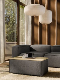 Reposapiés puf en tejido bouclé con espacio de almacenamiento Lennon