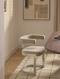 Silla cantilever tapizada Gianni