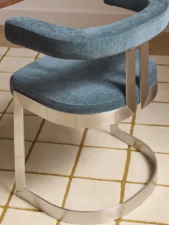 Silla cantilever tapizada Gianni