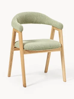 Silla con reposabrazos tapizada en tejido bouclé Nik