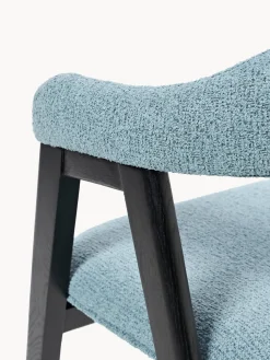 Silla con reposabrazos tapizada en tejido bouclé Nik