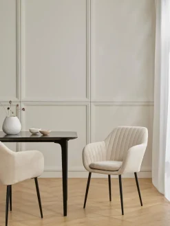 Silla de terciopelo con reposabrazos Emilia