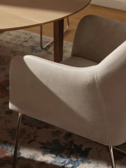 Silla de terciopelo con reposabrazos Isla