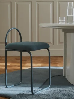 Silla en tejido bouclé Angui