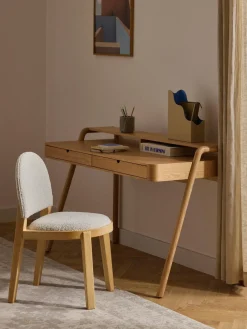 Silla tapizada en tejido bouclé Neelia