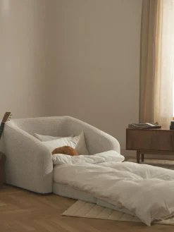 Sillón cama de borreguillo bouclé Eliot