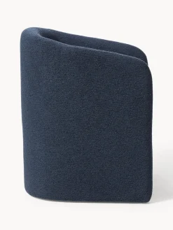 Sillón con reposabrazos en tejido bouclé Mairo