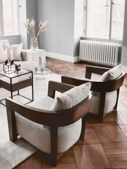 Sillón de salón artesanal de caoba Rubautelli