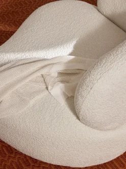 Sillón en tejido bouclé Alba