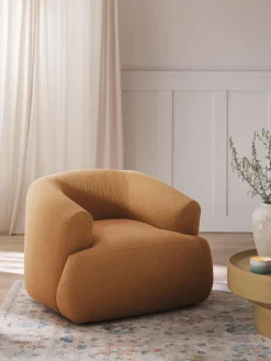 Sillón en tejido bouclé Sofia