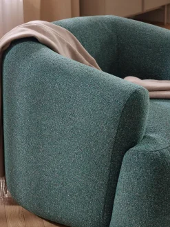 Sillón en tejido bouclé Sofia