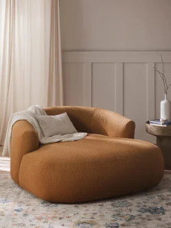 Sillón lounge grande en tejido bouclé Sofia