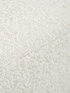 Sillón tapizado en tejido bouclé Irene