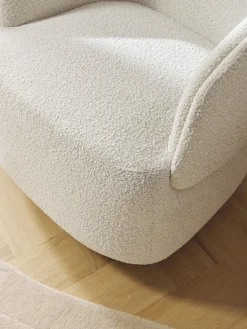 Sillón tapizado en tejido bouclé Irene