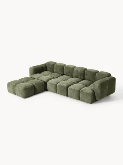 Sofá modular de borreguillo bouclé con reposapiés Tayla (4 plazas)