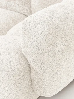 Sofá modular de borreguillo bouclé con reposapiés Tayla (3 plazas)