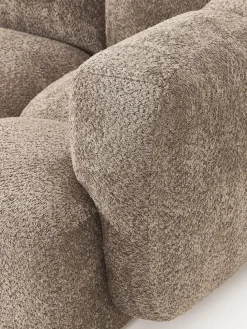 Sofá modular de borreguillo bouclé con reposapiés Tayla (3 plazas)