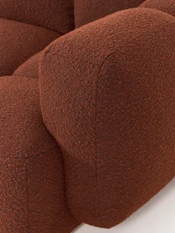 Sofá modular en tejido bouclé con reposapiés Tayla (4 plazas)