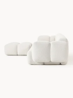 Sofá modular en tejido bouclé con reposapiés Tayla (4 plazas)